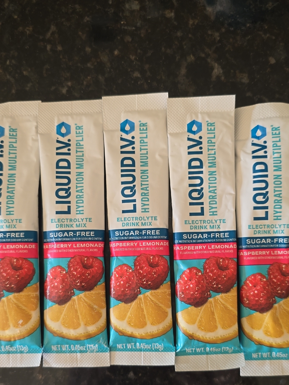 LIQUID I.V.  Raspberry Lemonade Hydration Multiplier Singles - Pink/Yellow